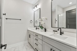 Hair dryer, towels, soap, shampoo