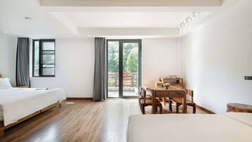 Deluxe Triple Room, Patio, Mountain View | 1 bedroom, desk, laptop workspace, free WiFi