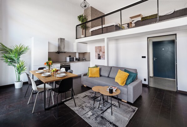 Classic Apartment, Balcony, Courtyard View | Living area | 40-inch LCD TV with cable channels - Charming loft with balcony (Prague)