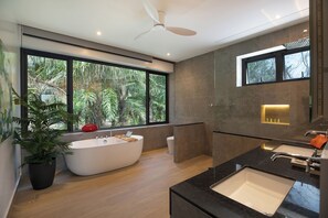Shower, hair dryer, towels, toilet paper