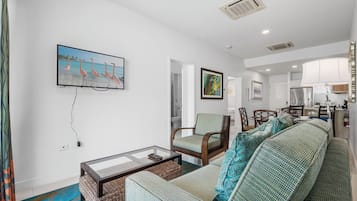 Standard Apartment, 2 Bedrooms | Living area | 40-inch Smart TV with cable channels