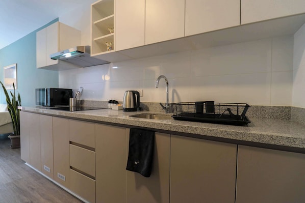 Microwave, stovetop, coffee/tea maker, toaster