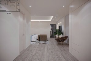 Chambre Royale, balcon, vue ville | Coin séjour