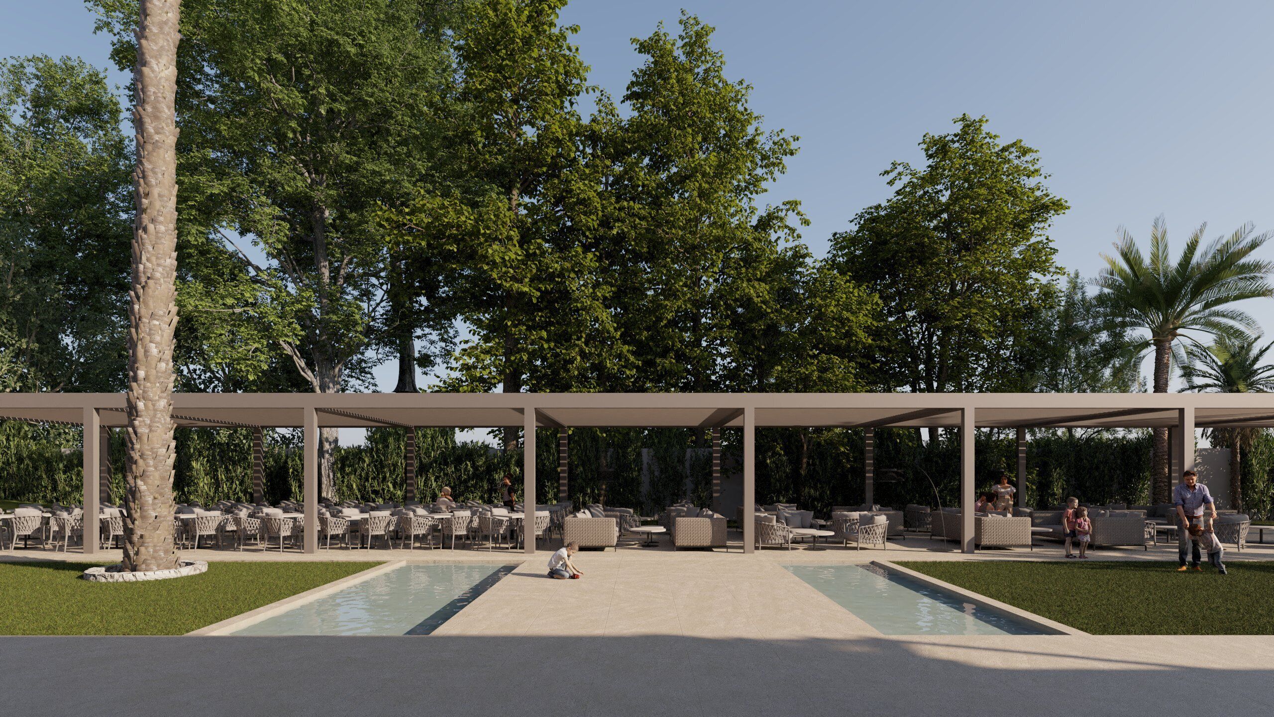An outdoor seating area with tables and chairs, surrounded by trees and a pool.