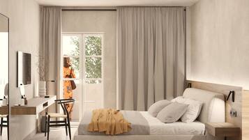 A modern bedroom with a bed, bedside table, and a desk with a chair.