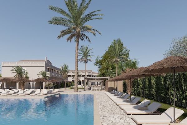 Seasonal outdoor pool, open 9:30 AM to 6:00 PM, pool umbrellas