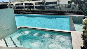 A swimming pool with a depth marker of 0.47m to 0.88m.