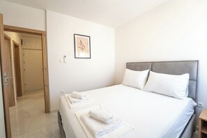 Comfort Apartment, 2 Bedrooms, Balcony | 2 bedrooms, iron/ironing board, free WiFi, bed sheets