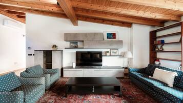 Apartment, Mountain View | Living room | 30-inch TV with digital channels