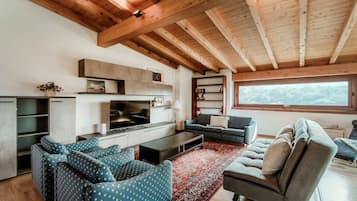 Apartment, Mountain View | Living area | 30-inch TV with digital channels