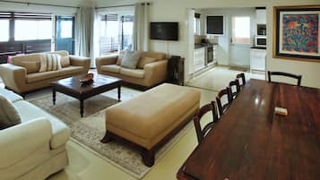 Family House, Lagoon View | Living area | 40-inch flat-screen TV with satellite channels, fireplace