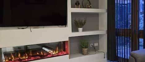 Standard Apartment | Living area | 43-inch Smart TV with digital channels