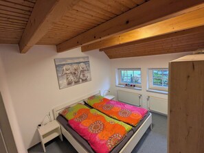 2 chambres, coffres-forts dans les chambres, fer et planche à repasser