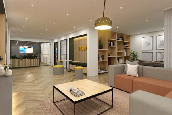 Relax in a comfortable living area with a sofa, armchairs, and coffee table.