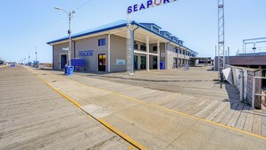 A pier with a building labeled "SEAPORT PIER" and a sign for "MONTGOMERY COUNTY POLICE". - Walk to Beach: North Wildwood Condo w/ Pool Access (North Wildwood)