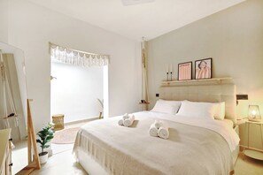 1 bedroom, desk, iron/ironing board, travel crib