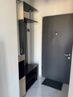 Deluxe appartement, uitzicht op tuin | Woonruimte