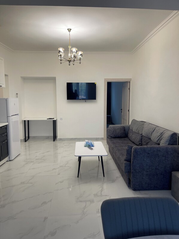 Appartement, uitzicht op de stad | Woonruimte