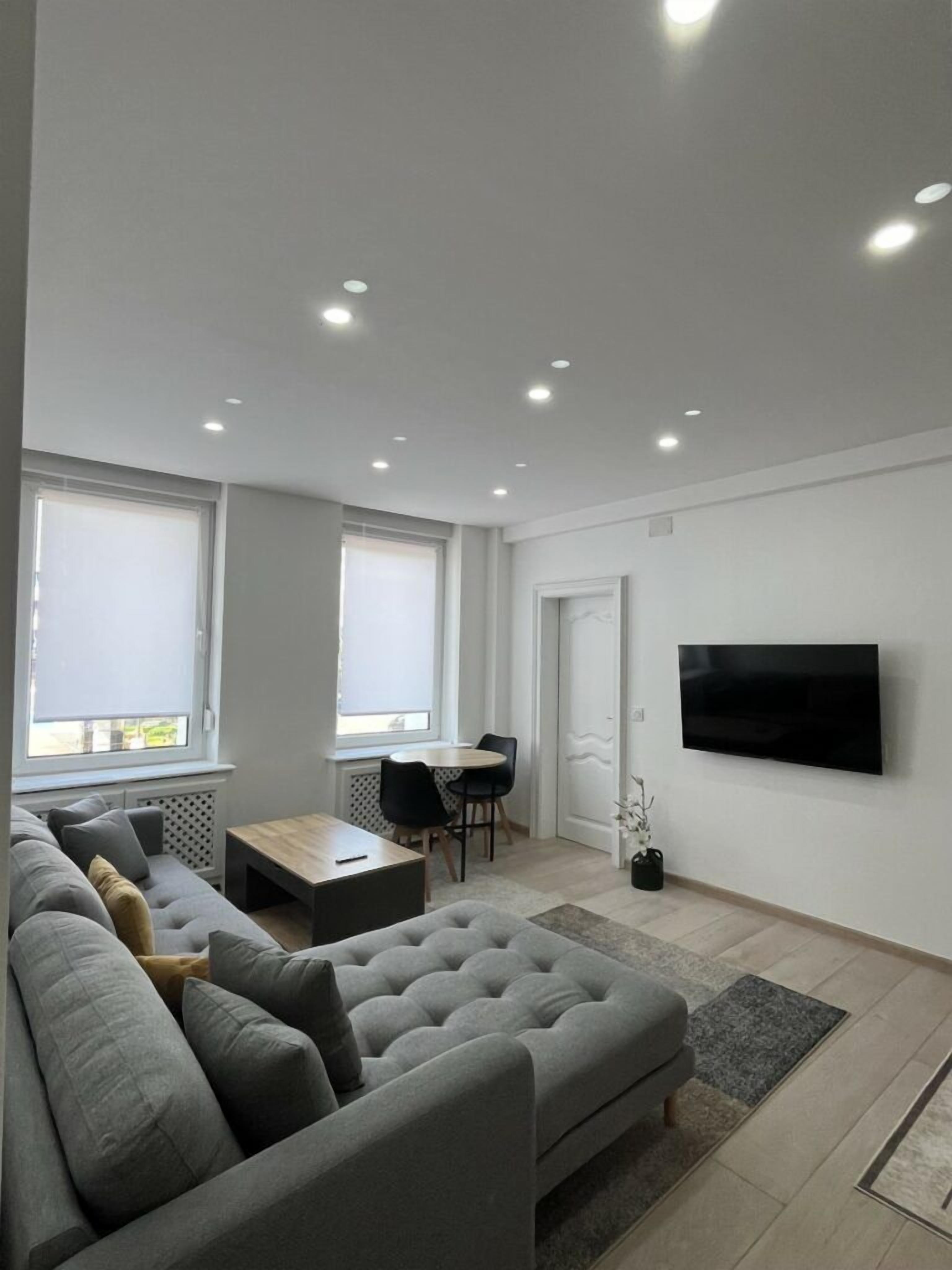 Standard-Apartment | Wohnbereich | Fernseher
