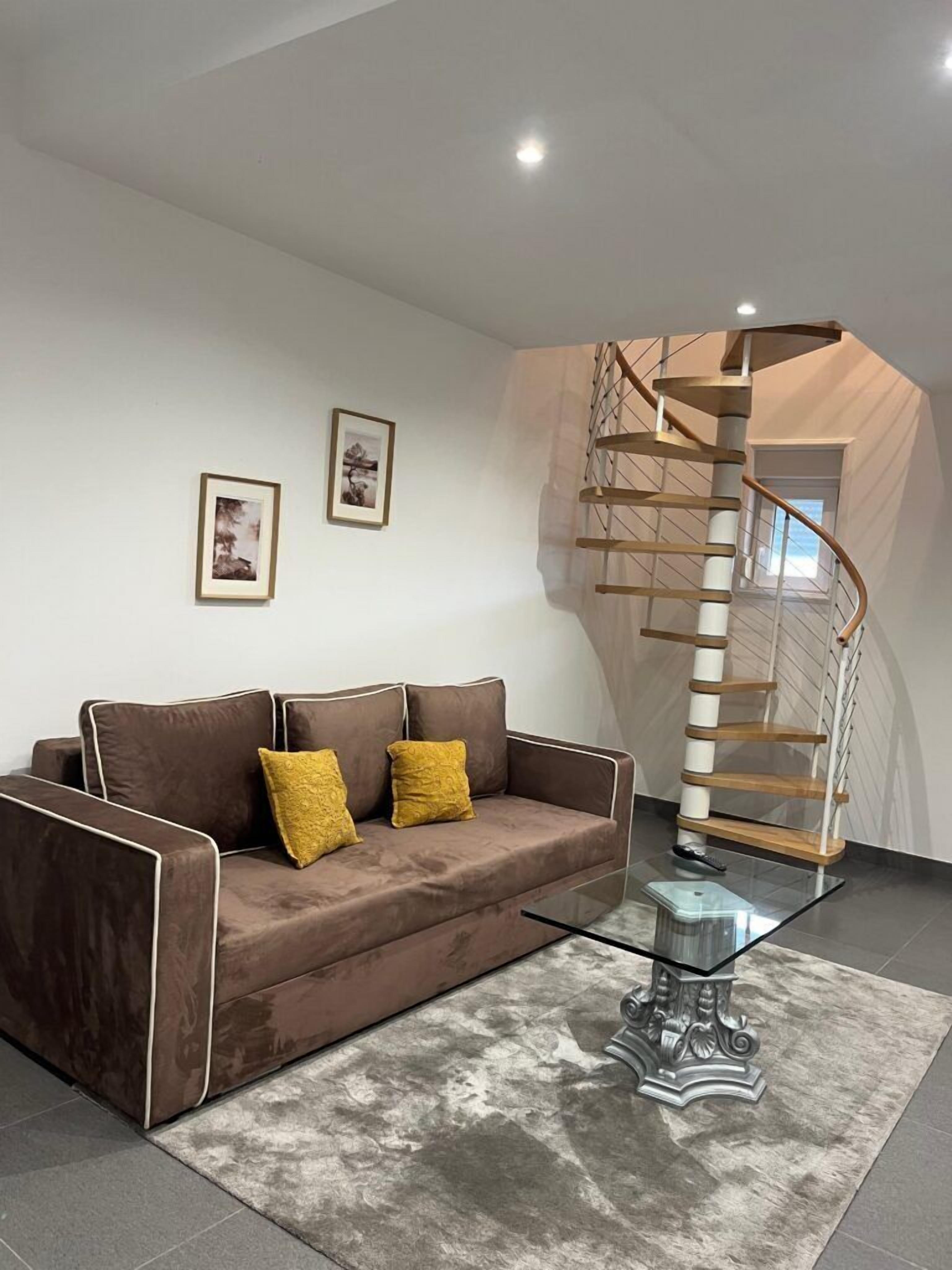 Maisonnette, patio, uitzicht op tuin | Woonruimte | Een televisie