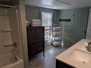 Shower, hair dryer, towels, soap