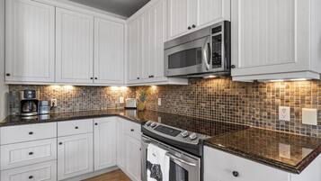 Condo, 2 Bedrooms | Private kitchen | Fridge, oven, coffee/tea maker, toaster