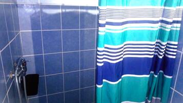 Shower, towels, toilet paper