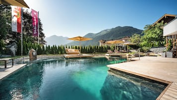 Indoor pool, seasonal outdoor pool, pool umbrellas, pool loungers
