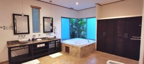 Shower, jetted tub, hair dryer, bidet