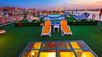 Indoor pool, outdoor pool, open 6:00 AM to 7:00 PM, pool umbrellas