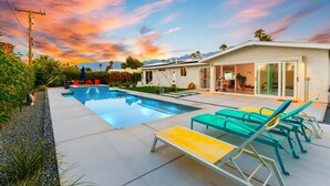 A modern house with a swimming pool, outdoor seating, and a patio area. - 25% Off 30+ Stay! Prime Location Private Pool, Spa (Palm Springs)