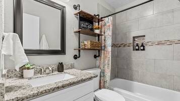 Hair dryer, towels, soap, toilet paper
