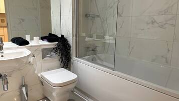 Apartment | Bathroom | Separate tub and shower, deep soaking tub, towels