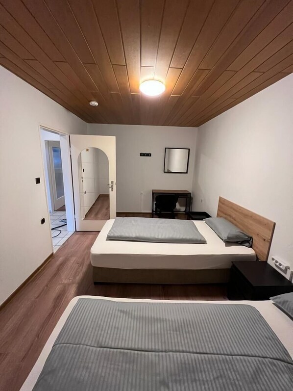 Economy Apartment, 3 Bedrooms, Non Smoking, Kitchen | 4 bedrooms, blackout drapes, soundproofing, iron/ironing board