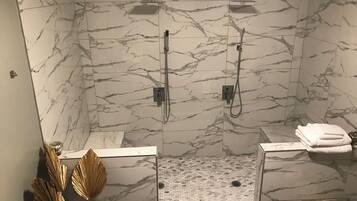 Shower, jetted tub, hair dryer, towels