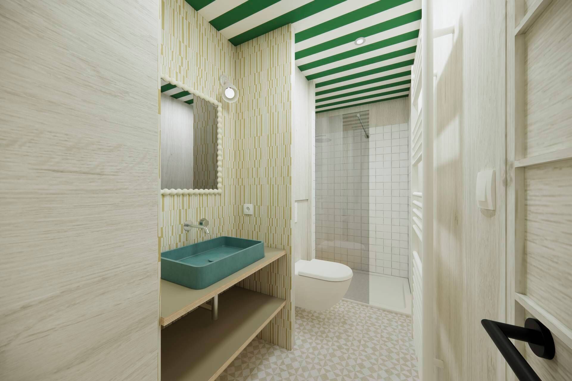A bathroom with a sink, mirror, toilet, and shower.