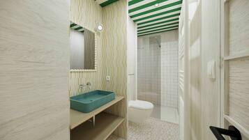 A bathroom with a sink, mirror, toilet, and shower.