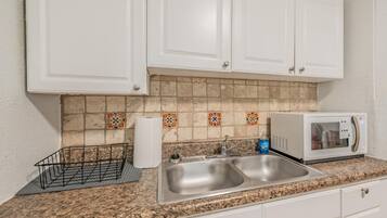 Fridge, microwave, coffee/tea maker, toaster