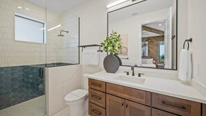 Shower, eco-friendly toiletries, hair dryer, towels