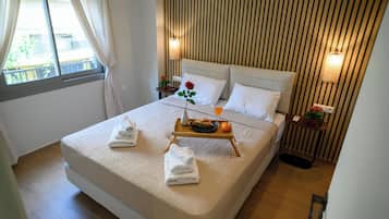 2 dormitorios, tabla de planchar con plancha, wifi y ropa de cama