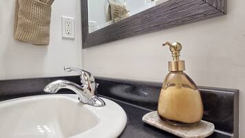 Hair dryer, towels, soap, shampoo