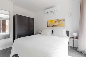 2 dormitorios, tabla de planchar con plancha, wifi y ropa de cama