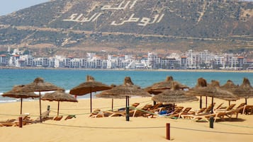 Sun-loungers, beach towels