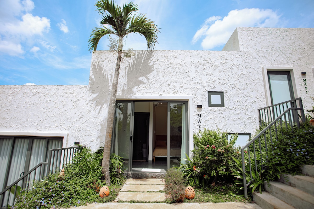 Deluxe Triple Room, Garden View | In-room safe, desk, laptop workspace, blackout curtains
