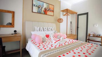 Luxury Studio Suite, Pool View | In-room safe, desk, laptop workspace, blackout curtains