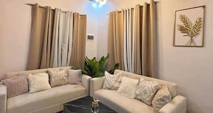Mollys transient 2-bedroom house in wonderful General Santos City with WiFi, AC