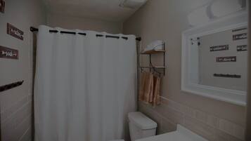 Hair dryer, towels, soap, shampoo