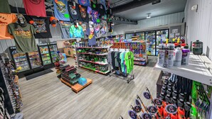 A retail store with various merchandise including clothing, sports equipment, and accessories. - RV Site 8 Camper - Hatfield McCoy Trails (Wilkinson)