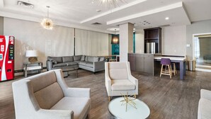 A modern hotel room with a living area, a dining area, and a kitchenette. - Eden Studio | Free Parking, Central, Gym Fast WIFI (Minneapolis)
