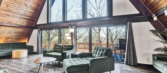 Spacious A-Frame sleeps 25 on 5 wooded acres with a private fishing pond